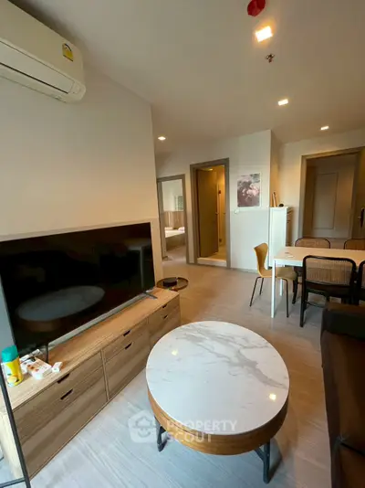 Modern living room with stylish furniture and open layout in a contemporary apartment.