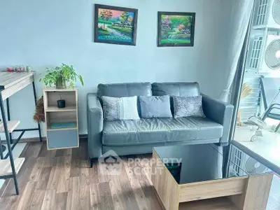 Stylish living room with modern gray sofa and elegant decor