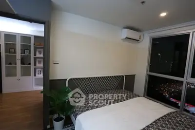 Modern bedroom with city view and air conditioning in stylish apartment