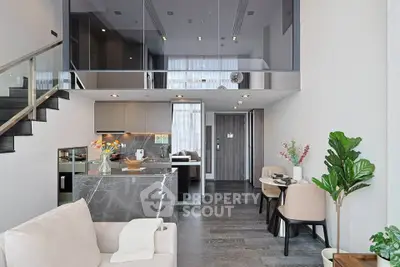 Luxurious modern living room with open kitchen and elegant decor