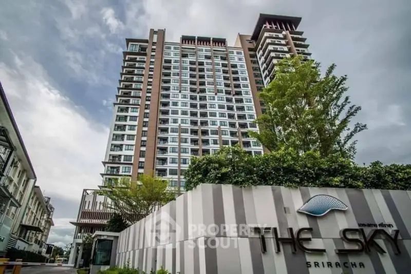 Modern high-rise condominium with lush greenery at The Sky Sriracha