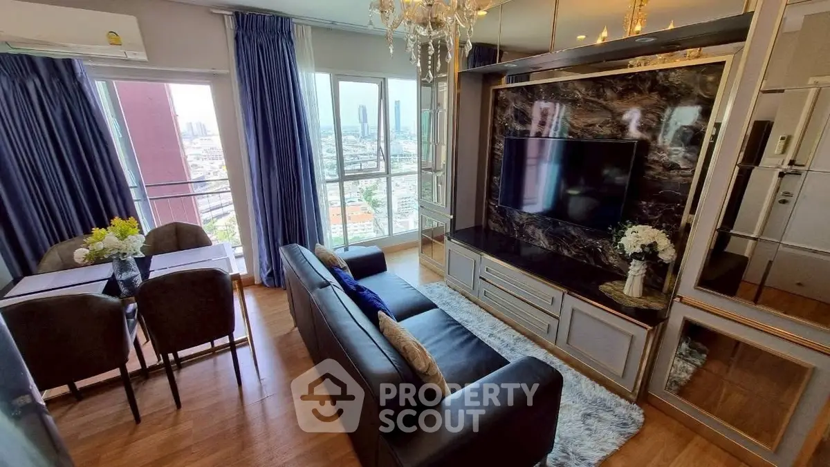 Luxurious living room with city view, elegant decor, and modern amenities in high-rise apartment.