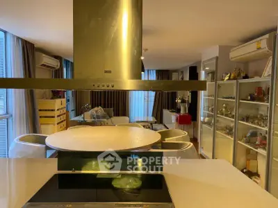Spacious modern living room with open kitchen and stylish decor