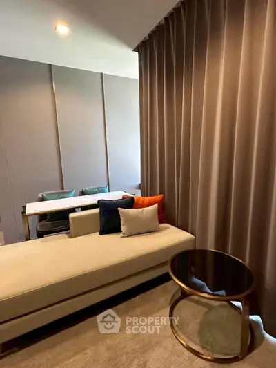 Modern living room with elegant chaise lounge and stylish side table