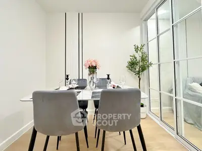 Modern dining area with elegant decor and natural light