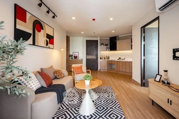 Modern open-layout living room with stylish decor and cozy ambiance