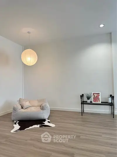 Minimalist living room with modern decor and cozy seating