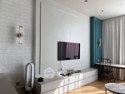 Modern living room with wall-mounted TV and stylish decor