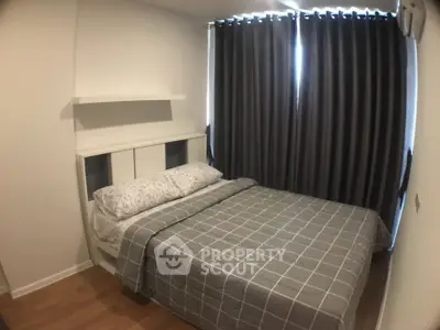 Cozy bedroom with modern decor and large window curtains