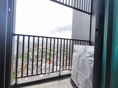 Stunning cityscape view from a modern high-rise balcony, perfect for urban living.