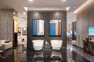 Luxurious modern lobby with elegant seating and artistic decor