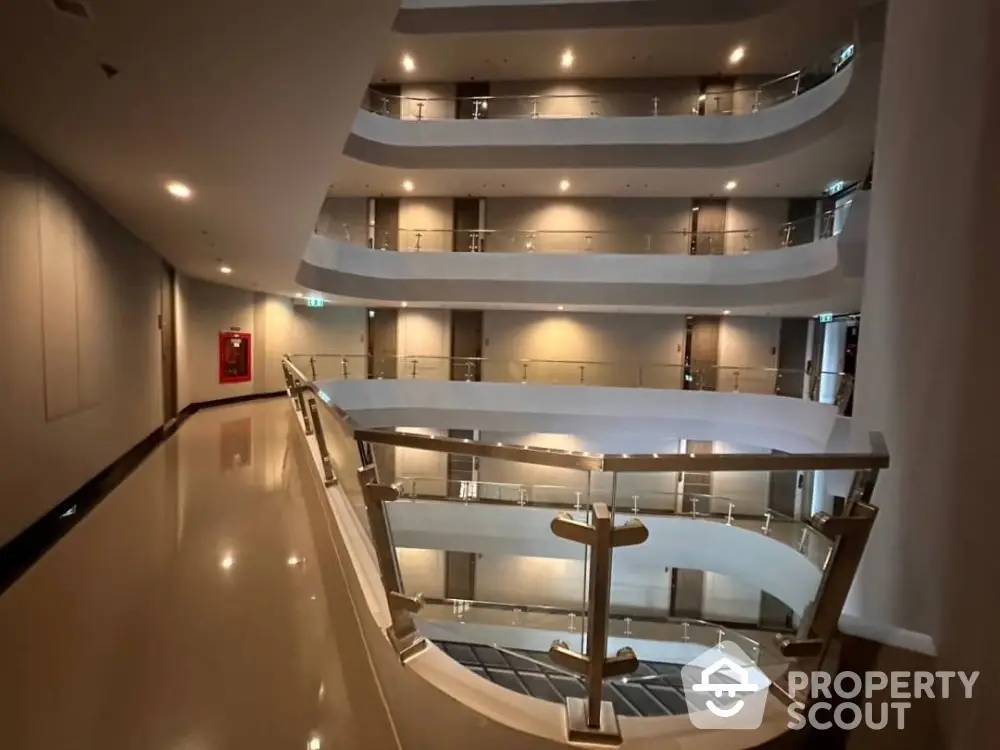 Modern multi-level building interior with sleek design and polished floors