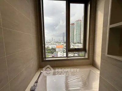 Modern bathroom with city view and large window, featuring sleek tiles and contemporary design.
