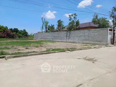 Spacious vacant land plot with potential for development in a serene neighborhood.