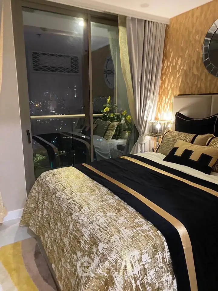 Luxurious bedroom with city view and elegant decor in modern apartment