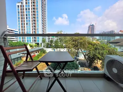 Charming balcony with city view, perfect for relaxation and enjoying the skyline.