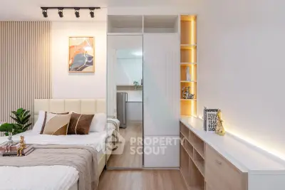 Modern bedroom with stylish decor and built-in storage solutions