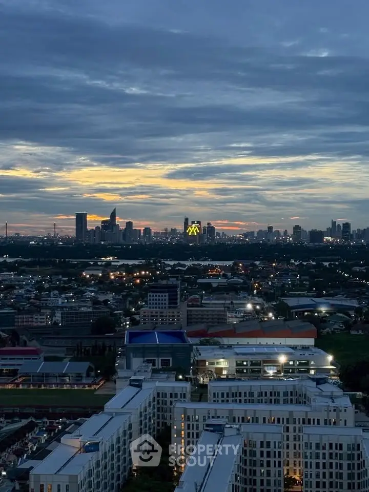 Stunning cityscape view from high-rise building at sunset