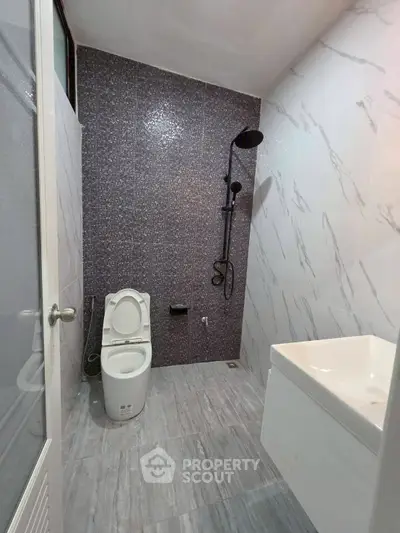 Modern bathroom with sleek design and marble tiles