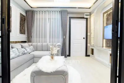 Luxurious modern living room with elegant decor and plush furnishings