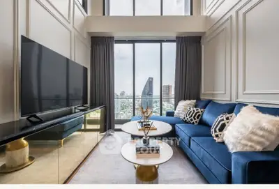 Luxurious high-rise living room with stunning city view and elegant decor