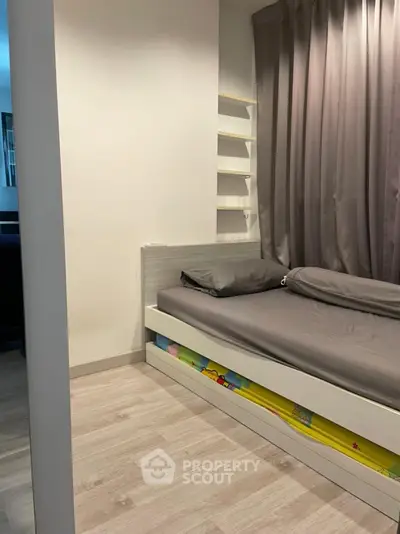 Cozy bedroom with modern design and ample storage space