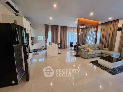 Spacious modern living room with open layout and elegant furnishings