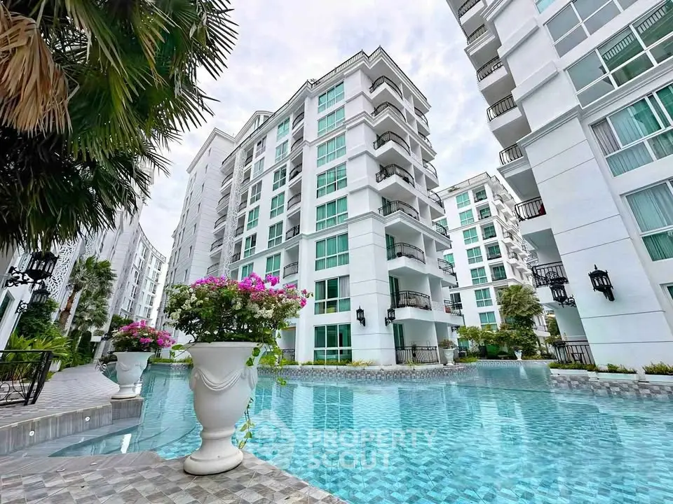 Luxurious condominium with stunning pool and modern architecture