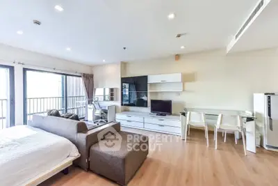 Spacious modern studio apartment with open layout and stylish furnishings