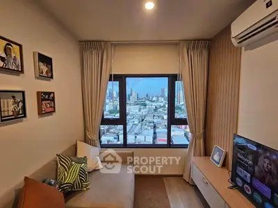 Modern living room with city view, cozy sofa, and wall-mounted TV in a stylish apartment.