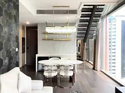 Luxurious modern living room with elegant dining area and stunning city view.