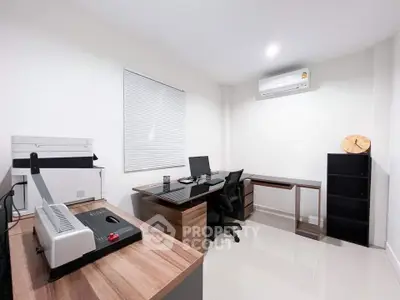 Modern study room with sleek furniture and air conditioning