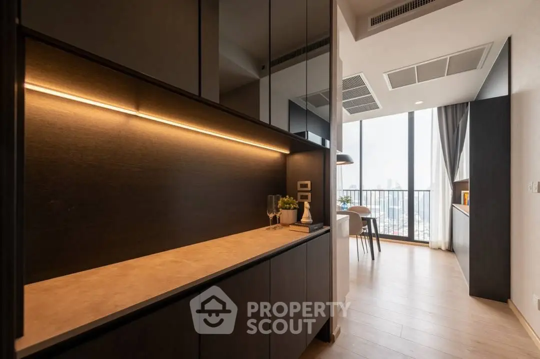 Modern apartment interior with sleek design and city view balcony