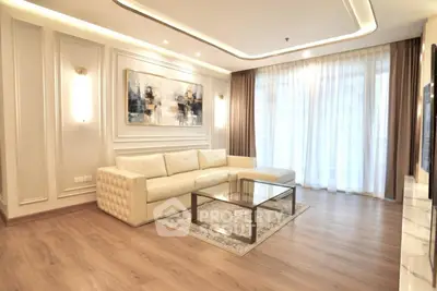 Luxurious living room with elegant decor and large windows