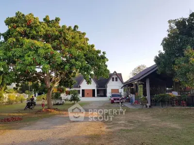 Charming countryside property with spacious garden and traditional architecture, perfect for serene living.