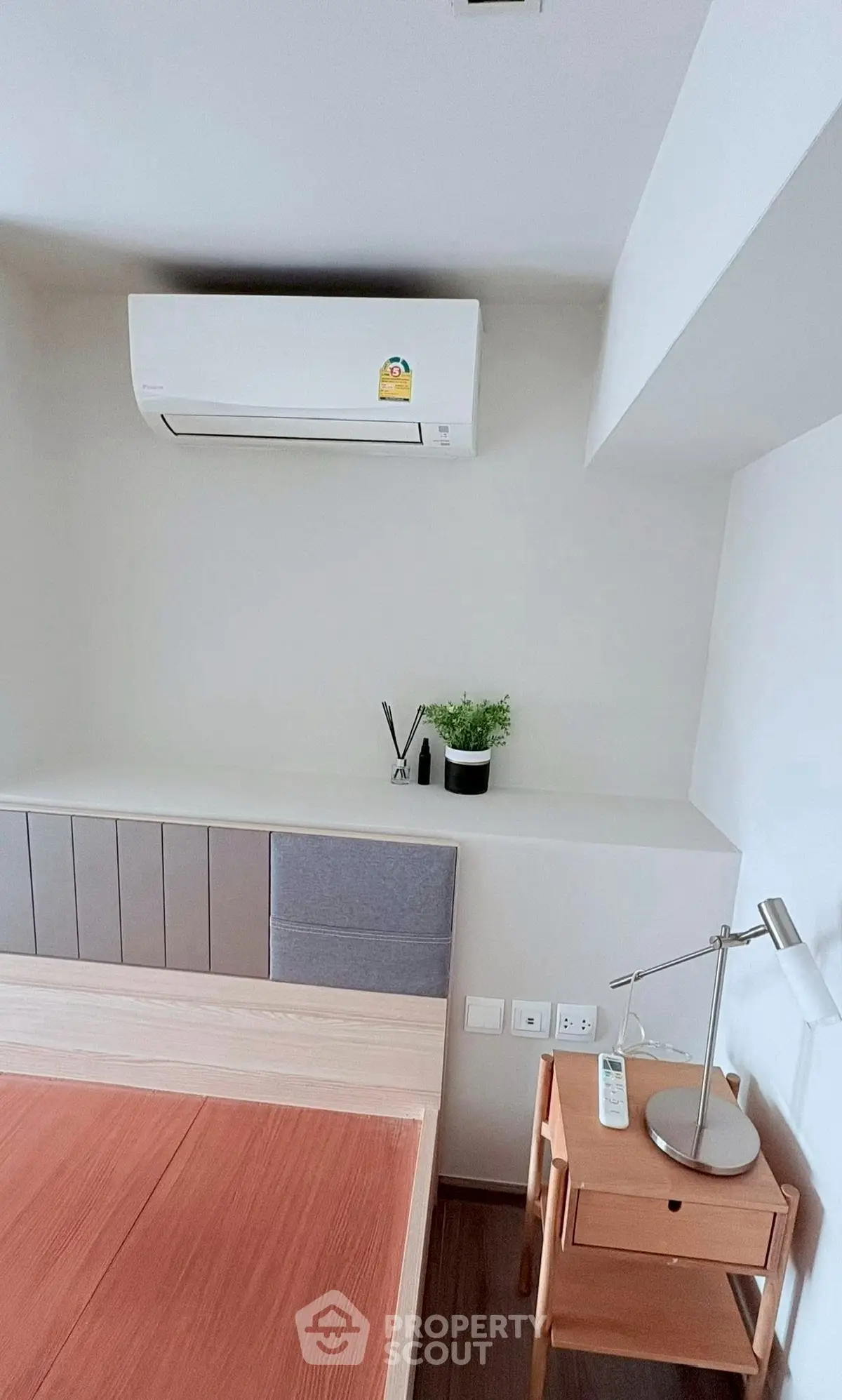 Modern bedroom with air conditioning and stylish decor