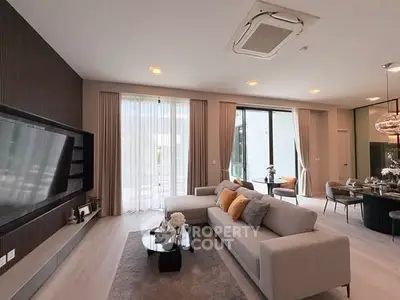 Luxurious modern living room with elegant decor and spacious layout, perfect for relaxation and entertainment.