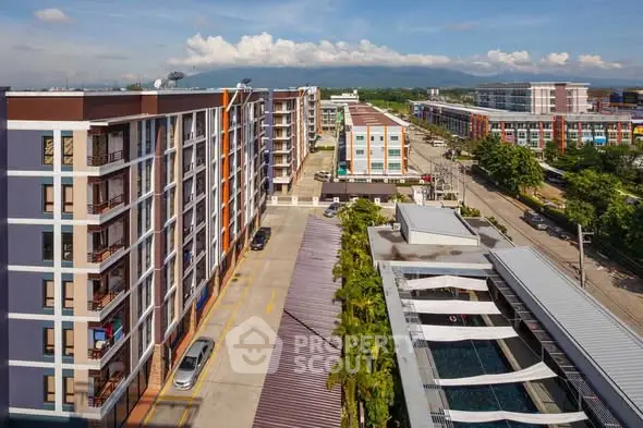 Modern apartment complex with spacious layout and scenic mountain views, ideal for urban living.