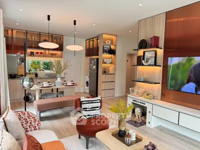Modern open-plan living room with stylish decor and integrated kitchen appliances