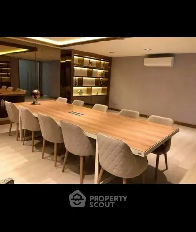 Luxurious conference room with elegant seating and ambient lighting, perfect for professional meetings.