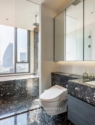 Luxurious modern bathroom with city view and sleek marble finishes