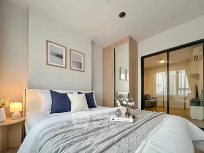 Modern bedroom with cozy decor and elegant design, featuring a comfortable bed and stylish furnishings.