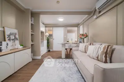 Stylish living room with modern decor and cozy ambiance, perfect for relaxation and entertaining guests.
