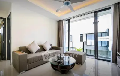 Modern living room with large windows and stylish furniture