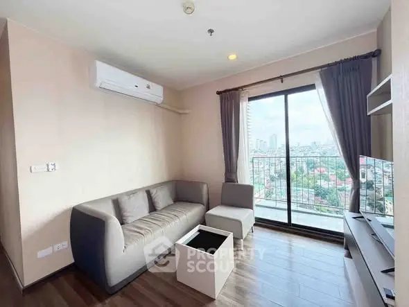 Modern living room with city view and sleek furniture