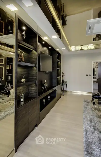Luxurious modern living room with sleek built-in shelving and elegant decor