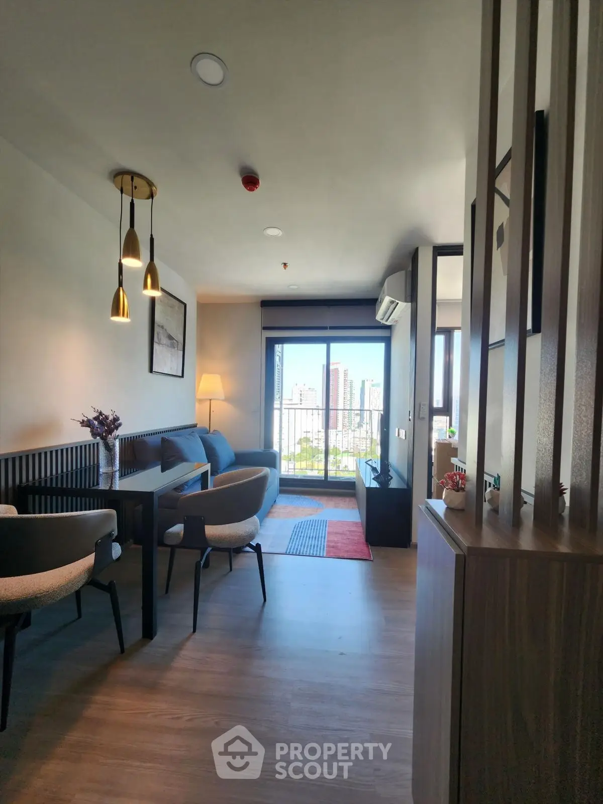 Modern living room with city view and stylish decor