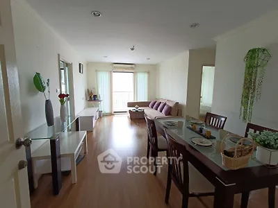 Spacious living room with dining area and modern decor