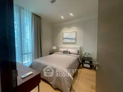 Modern bedroom with elegant decor and natural light