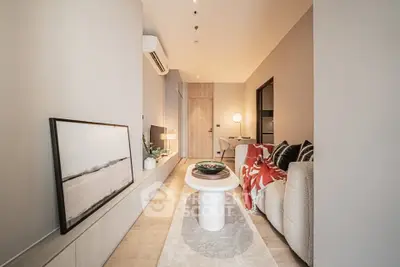 Modern living room with stylish decor and cozy seating area in a contemporary apartment.